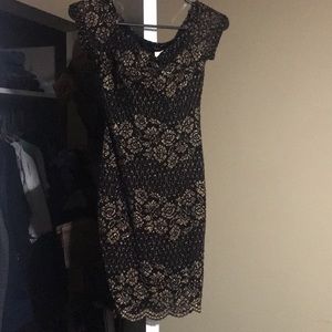 Black mini dress with gold embroidered pattern